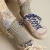 Gray socks with crystals on the leg