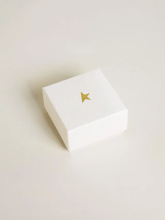 Bee-shaped charm in gold-colored brass with crystals
