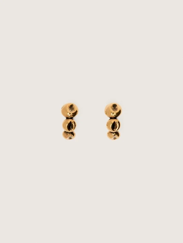 Hoop earrings with antique gold-colored studs