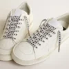 Ice-gray cotton laces with contrasting black stars
