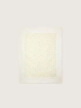 Journey Baby blanket in white cotton fleece with peach-pink mascot print