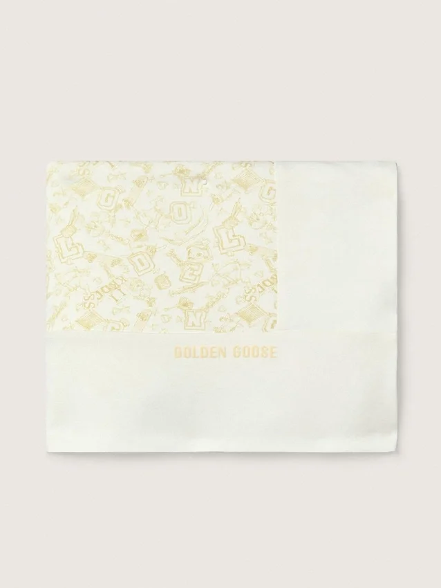 Journey Baby blanket in white cotton fleece with peach-pink mascot print