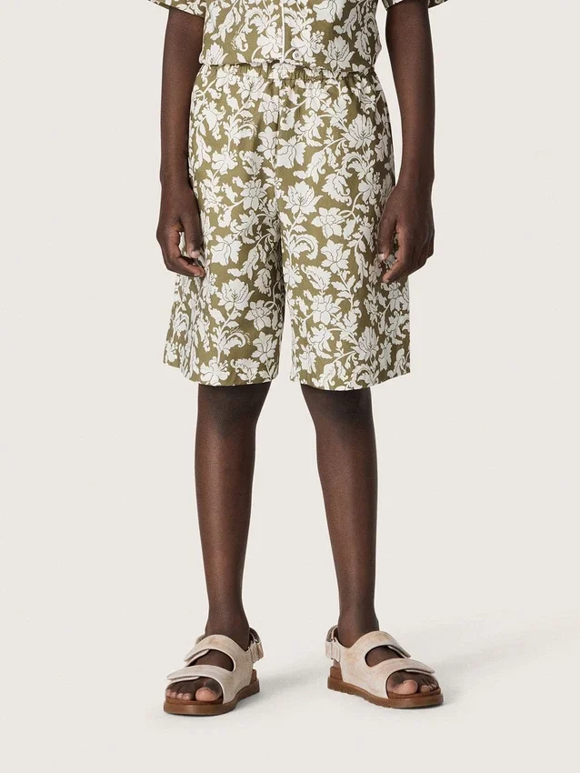 Journey boys’ cotton canvas shorts with green and white floral print