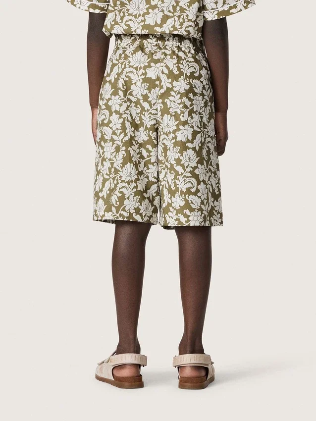Journey boys’ cotton canvas shorts with green and white floral print