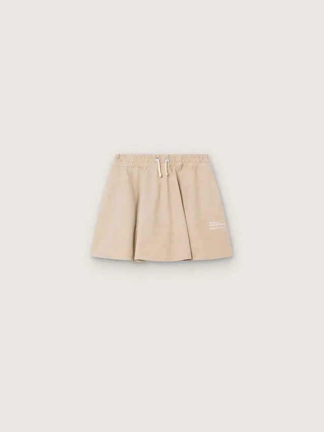 Journey girls’ miniskirt in beige cotton gabardine with print