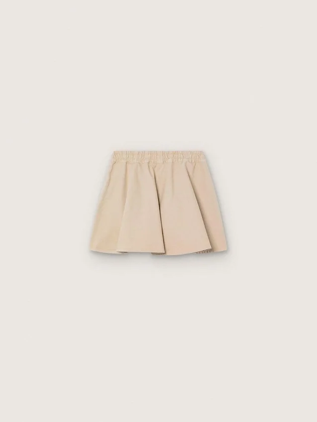 Journey girls’ miniskirt in beige cotton gabardine with print