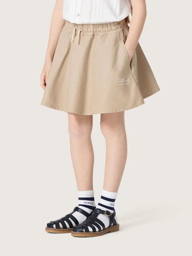 Journey girls’ miniskirt in beige cotton gabardine with print