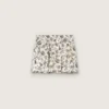 Journey girls’ miniskirt in white cotton canvas with green floral print