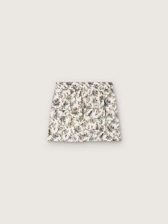 Journey girls’ miniskirt in white cotton canvas with green floral print