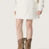 Journey girls’ miniskirt in white cotton fleece with crystals and embroidery