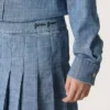 Journey girls’ pleated miniskirt in light blue cotton chambray with embroidered logo
