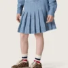 Journey girls’ pleated miniskirt in light blue cotton chambray with embroidered logo