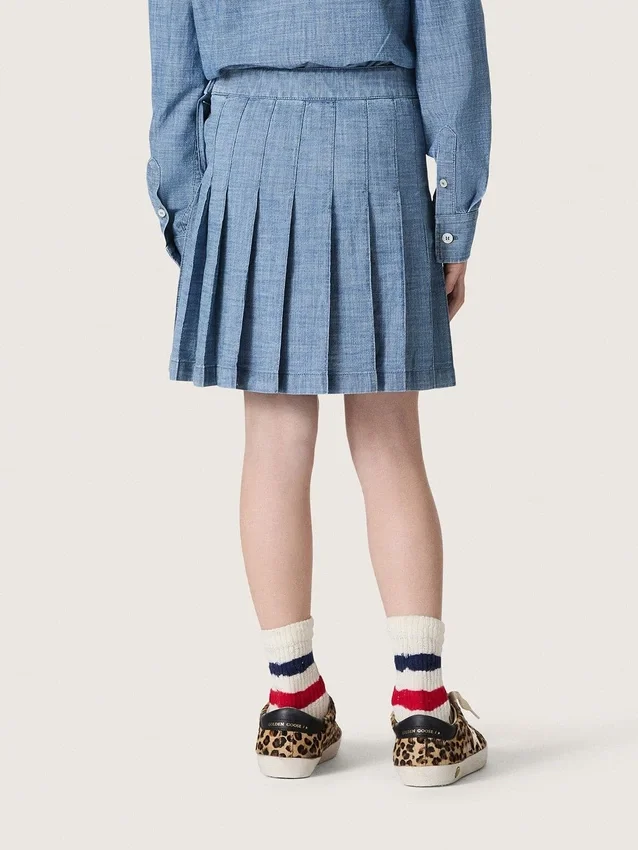 Journey girls’ pleated miniskirt in light blue cotton chambray with embroidered logo