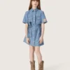 Journey girls’ short-sleeved shirt dress in light blue cotton chambray with embroidered patch