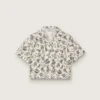 Journey girls’ short-sleeved shirt in white cotton canvas with a green floral print