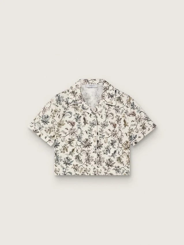 Journey girls’ short-sleeved shirt in white cotton canvas with a green floral print