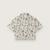 Journey girls’ short-sleeved shirt in white cotton canvas with a green floral print