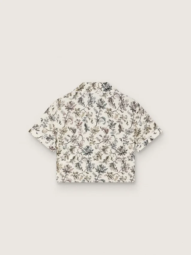 Journey girls’ short-sleeved shirt in white cotton canvas with a green floral print
