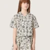 Journey girls’ short-sleeved shirt in white cotton canvas with a green floral print