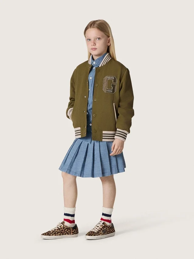 Journey girls’ pleated miniskirt in light blue cotton chambray with embroidered logo