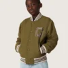 Journey unisex bomber jacket in military-green nylon twill with embroidered patch