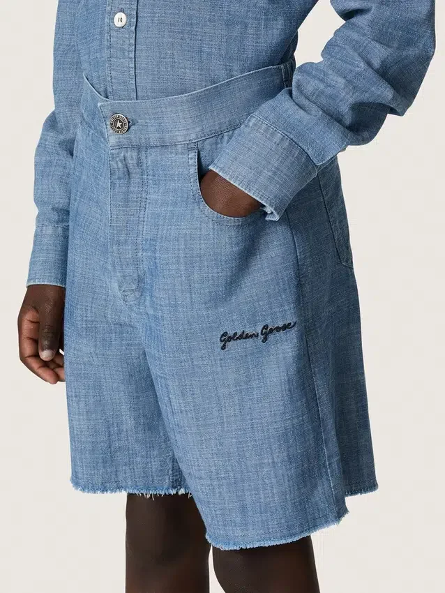 Journey unisex shorts in light blue cotton chambray with embroidered logo