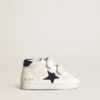 June Junior in nappa with dark blue suede star and heel tab