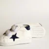 June Junior in nappa with dark blue suede star and heel tab