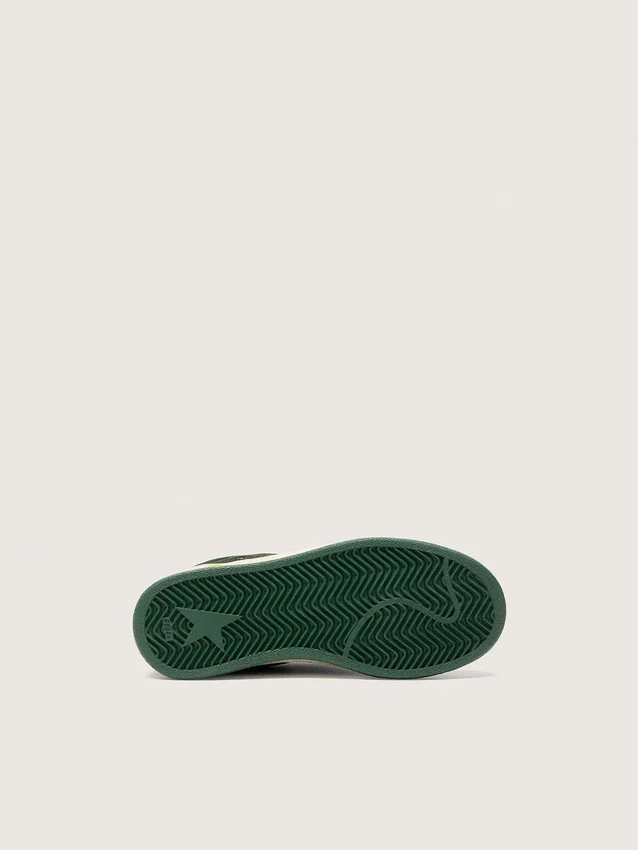 Junior Ball Star in forest-green suede with cream leather star and heel tab