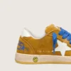 Junior Ball Star in ocher suede with glossy white leather star and heel tab