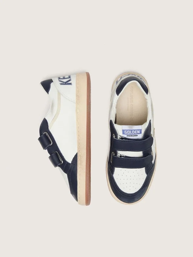 Junior Ball Star in white leather with metallic silver leather star and dark blue leather inserts