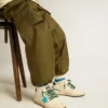 Junior Ball Star with turquoise star and green suede heel tab