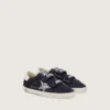 Junior Old School in blue suede with silver glitter star and white leather heel tab