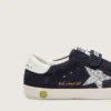 Junior Old School in blue suede with silver glitter star and white leather heel tab