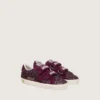 Junior Old School in burgundy glitter with burgundy suede star and heel tab