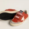Junior Old School in orange nappa with white star and cream-colored leather heel tab