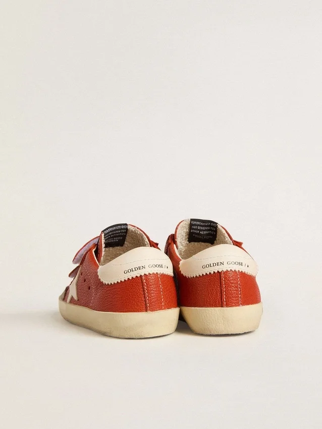 Junior Old School in orange nappa with white star and cream-colored leather heel tab
