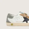 Junior Old School with black leather star and beige and green suede inserts