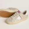 Junior Super-Star in sand-colored laminated-effect suede with white leather star