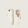 Junior Super-Star with gold glitter star and silver metallic leather heel tab