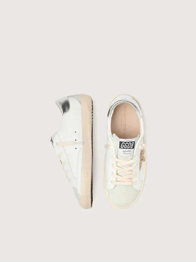 Junior Super-Star with gold glitter star and silver metallic leather heel tab