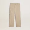 Kids’ beige chino pants with multicolor splashes
