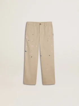 Kids’ beige chino pants with multicolor splashes