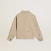 Kids’ beige jacket with multicolor splashes