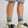 Kids’ gray socks with distressed details and worn-white and blue stripes