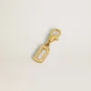 Letter D charm in gold-colored brass with crystals