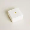 Letter E charm in gold-colored brass with crystals