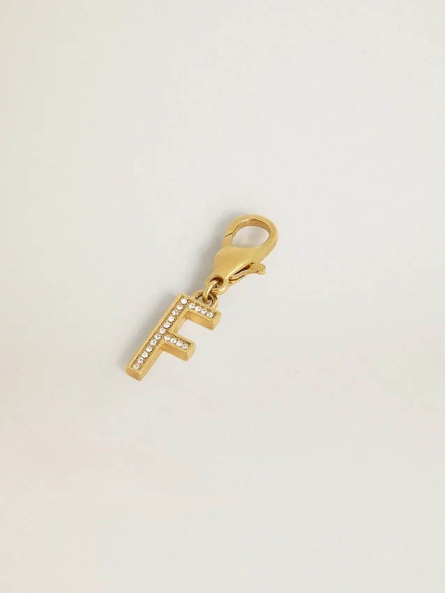 Letter F charm in gold-colored brass with crystals