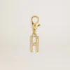 Letter H charm in gold-colored brass with crystals