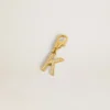 Letter K charm in gold-colored brass with crystals